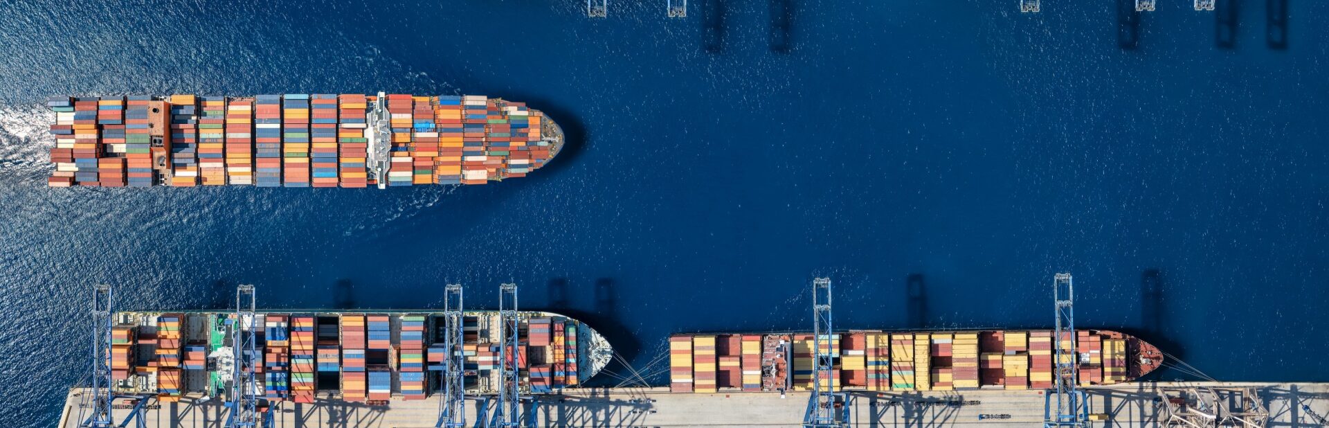 An aerial view of a cargo ship harbour.