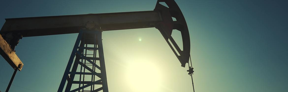 A silhouette of an oil pump.