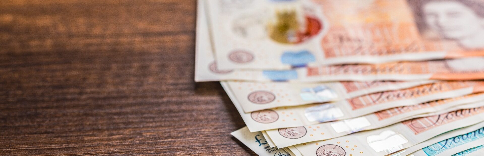UK bank notes on a table.